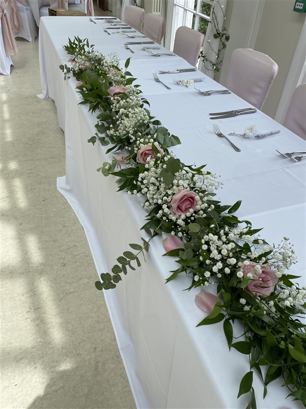 TABLE RUNNERS OR TOP TABLE ARRANGEMENTS 